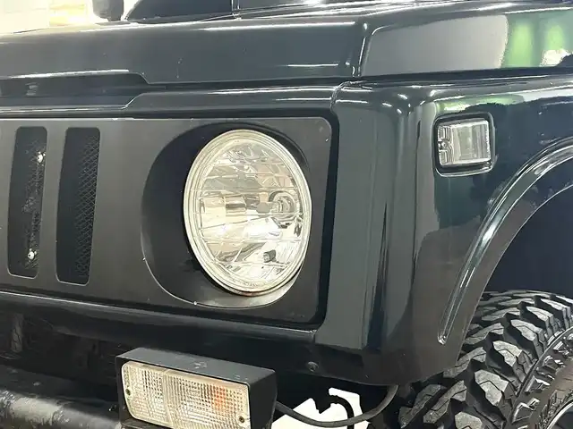 スズキ ジムニー ワイルドウィンド LTD 道央・札幌 1993(平5)年 18.3万km ダーククラシックジェイドパール 5MT/リフトアップ/マッドタイヤ/　GEOLANDAR　M/T　G003/　2025年製　9mm/前後パイプバンパー/社外マフラー（車検対応）/社外ヘッドライトレンズ/社外ウインカーレンズ（前/横）/社外フロントグリル/社外ステアリング/社外シートカバー/ナンバー移動キット/社外オーディオ/　CD/AUX/USB/FM/AM