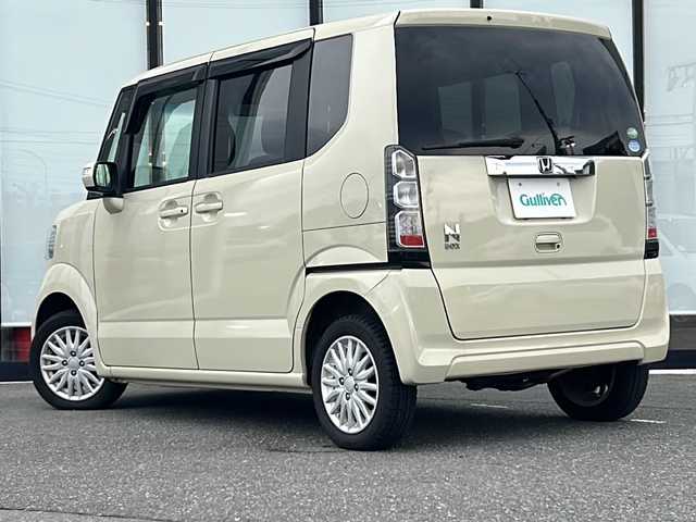 ホンダ Ｎ ＢＯＸ G Lパッケージ 山形県 2013(平25)年 8.1万km ヒダマリアイボリーパール 禁煙車/４WD/横滑り防止装置/バックカメラ/純正ナビ/（CD/DVD/Bluetooth）/片側パワースライドドア/純正フロアマット/HIDヘッドライト/フォグランプ/オートライト/プッシュスタート/スマートキー