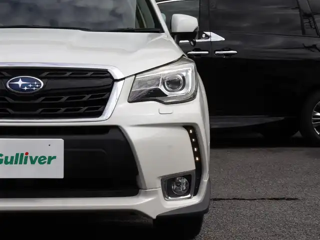スバル フォレスター 2．0XT アイサイト 神奈川県 2015(平27)年 5.9万km クリスタルホワイトP 4WD/シルバールーフレール/ステアリングスイッチ/ETC /バックカメラ /純正メモリナビ /CD/DVDプレーヤー/フルセグテレビ/シートヒーター/クルーズコントロール/ドアバイザー/プッシュスタート/保証書/取説/スペアキー/記録簿(H28/29/30/R3/5/6/)
