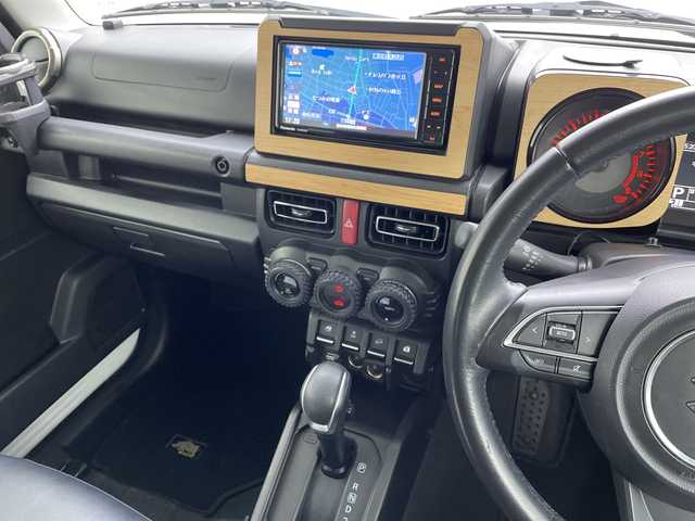 スズキ ジムニー XC 愛知県 2021(令3)年 3.1万km ピュアホワイトP 純正ナビ/・Bluetooth接続/・フルセグTV/・CD/DVD再生機能/USBポート/バックカメラ/ビルトインETC/前席シートヒーター/LEDヘッドライト（オートライト/オートハイビーム）/フォグランプ/純正16インチAW/純正フロアマット/ドアバイザー/衝突被害軽減ブレーキ/車線逸脱警報機能