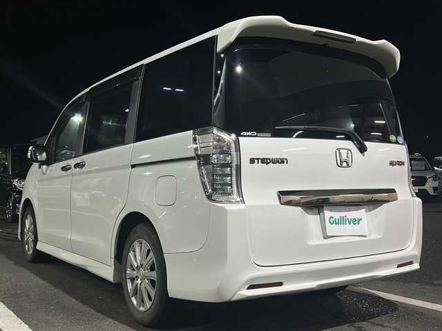 ホンダ ステップワゴン スパーダ Z クールスピリット 京都府 2013(平25)年 17.2万km ホワイトオーキッドパール 4WD/純正メモリナビ/フルセグテレビ/バックカメラ/フリップダウンモニター/アイドリングストップ/クルーズコントロール/プッシュスタート/両側パワースライドドア/ETC/シートヒーター