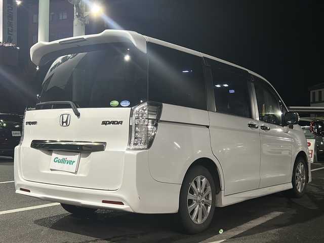 ホンダ ステップワゴン スパーダ Z クールスピリット 京都府 2013(平25)年 17.2万km ホワイトオーキッドパール 4WD/純正メモリナビ/フルセグテレビ/バックカメラ/フリップダウンモニター/アイドリングストップ/クルーズコントロール/プッシュスタート/両側パワースライドドア/ETC/シートヒーター