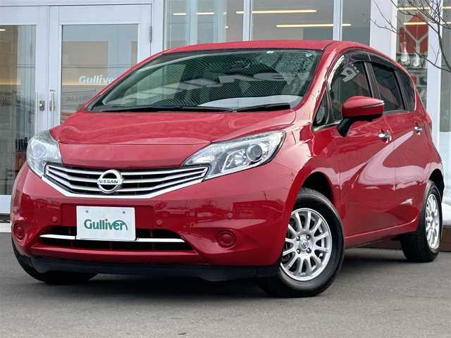 日産 ノート メダリスト X FOUR Vセレ+セーフティⅡ 道央・札幌 2016(平28)年 2.5万km バーニングレッド 純正HDDナビ　MC315D-w/（BT＆CD＆DVD＆フルセグ＆USB）/ワンオーナー/全方位カメラ/前方ドライブレコーダー/社外ETC/レーンキープアシスト/横滑り防止装置/エマージェンシーブレーキ/純正スタッドレスタイヤ積載(185/70R14)/LEDヘッドライト/オートライト/電動格納ミラー/純正フロアマット/フルフラットシート/ベンチシート/ステアリングスイッチ/コーナーセンサー（前後）