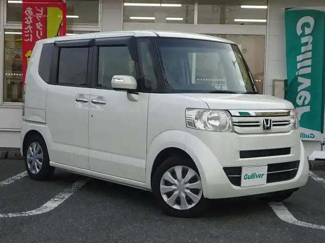 ホンダ Ｎ ＢＯＸ G Lパッケージ 静岡県 2016(平28)年 10万km プレミアムホワイトパールⅡ ワンオーナー/禁煙車/Gathers SDナビ：VXM-174VFXi/（SD/CD/DVD/フルセグ/AM/FM)/ビルトインETC/ステアリングリモコン/電動格納ミラー（ウィンカー付き）/片側パワースライドドア/スマートキー/プッシュスタート/シートバックテーブル/後席サンシェード/バックカメラ/純正フロアマット・バイザー/スペアキー/保証書・取扱説明書