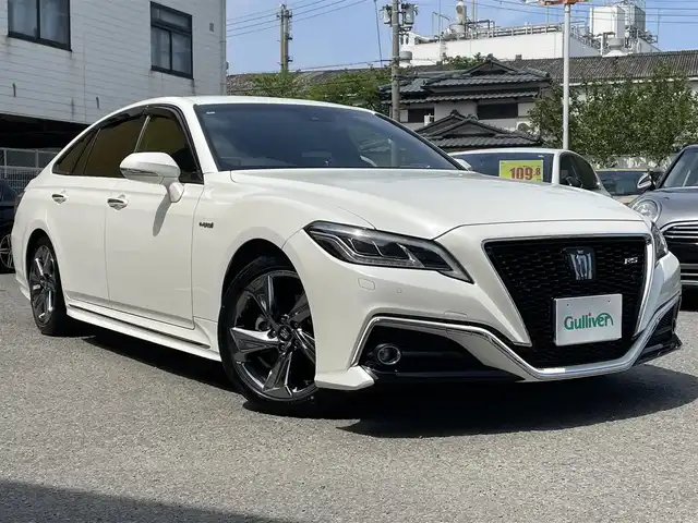 トヨタ クラウン ハイブリッド RS 和歌山県 2019(平31)年 18.8万km ホワイトパールクリスタルシャイン 純正ナビ/（AM/FM/DVD/CD/USB/Miracast/フルセグTV/Bluetooth/AUX)/ワンオーナー/プリクラッシュセーフティ/クリアランスソナー/パーキングサポート/ロードサインアシスト/レーンキープアシスト（操舵支援有）/シートヒーター/エアシート/ハンドルヒーター/D/Nパワーシート/電子パーキング/前後ドライブレコーダー/社外レーダー/EV/オートライト/純正アルミホイール/純正フロアマット/保証書/取扱説明書
