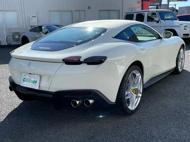 フェラーリ フェラーリ ローマ 神奈川県 2023(令5)年 0.3万km BIANCO AVUS 赤革シート/カーボンステアリング/純正20インチAW/イエローキャリパー/スクーデリアエンブレム/カーボンセンターパネル/カーボンパドルシフト/ワイヤレス充電/ヘッドレスト跳ね馬刺繍/純正メモリーナビ/バックカメラ/クルーズコントロール/LDW/BSM/LEDヘッドライト/コーナーセンサー/前席パワーシート/シートヒーター/USB/Bluetooth/AppleCarPlay/ETC2.0/スマートキー×2/R6/7年ディーラー整備記録/純正ボディカバー/充電器/保証書・取説あり