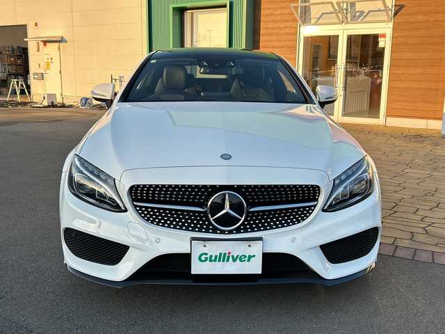 メルセデス・ベンツ Ｃ１８０ クーペ スポーツ+ 宮崎県 2016(平28)年 6.7万km ポーラホワイト AMGスタイリングパッケージ/パノラミックスライティングルーフ/純正ナビ/Bluetooth/フルTV/バックモニター/ETC/本革黒シート/シートメモリー/19インチAW/スマートキー/シートヒーター/電子パーキング/クリアランスソナー