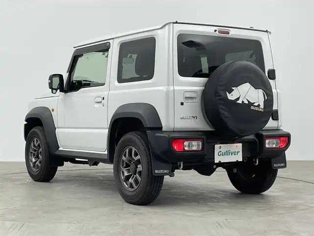 スズキ ジムニー シエラ JC 大分県 2022(令4)年 2.3万km ピュアホワイトP 純正７型ディスプレイオーディオ/(CD/DVD/BT/ipod/AUX/FM/AM)/バックカメラ/デュアルセンサーブレーキサポート/先行車発進お知らせ機能/標識認識機能/誤発進抑制機能/車線逸脱警報機能/ふらつき警報機能/ハイビームアシスト/シートヒーター/ミラーヒーター/ドラレコ前方/ビルトインETC/ステアリングリモコン/スマートキー2本/電動格納ウィンカーミラー/フォグランプ/背面タイヤカバー/マッドガード