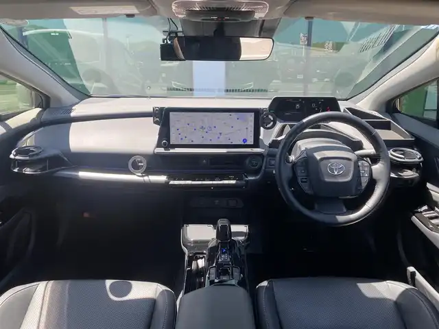 トヨタ プリウス Z 香川県 2023(令5)年 1.4万km アティチュードブラックマイカ 登録時走行距離 13997km/メーカーオプションナビ/→AM/FM/フルセグTV/Bluetooth/パノラマビューモニター/アダプティブクルーズコントロール/ビルトインETC2.0/ブラインドスポットモニター/ステアリングヒーター/前後ドライブレコーダー/黒レザーシート/メモリー付きパワーシート/シートヒーター/シートベンチレーション/パワーバックドア/LEDオートライト/オートハイビーム/プッシュスタート/スペアキー/クリアランスソナー/トヨタセーフティセンス
