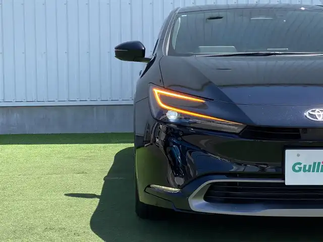 トヨタ プリウス Z 香川県 2023(令5)年 1.4万km アティチュードブラックマイカ 登録時走行距離 13997km/メーカーオプションナビ/→AM/FM/フルセグTV/Bluetooth/パノラマビューモニター/アダプティブクルーズコントロール/ビルトインETC2.0/ブラインドスポットモニター/ステアリングヒーター/前後ドライブレコーダー/黒レザーシート/メモリー付きパワーシート/シートヒーター/シートベンチレーション/パワーバックドア/LEDオートライト/オートハイビーム/プッシュスタート/スペアキー/クリアランスソナー/トヨタセーフティセンス