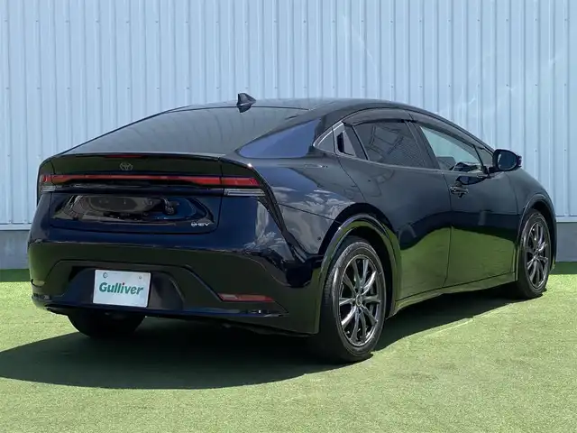 トヨタ プリウス Z 香川県 2023(令5)年 1.4万km アティチュードブラックマイカ 登録時走行距離 13997km/メーカーオプションナビ/→AM/FM/フルセグTV/Bluetooth/パノラマビューモニター/アダプティブクルーズコントロール/ビルトインETC2.0/ブラインドスポットモニター/ステアリングヒーター/前後ドライブレコーダー/黒レザーシート/メモリー付きパワーシート/シートヒーター/シートベンチレーション/パワーバックドア/LEDオートライト/オートハイビーム/プッシュスタート/スペアキー/クリアランスソナー/トヨタセーフティセンス