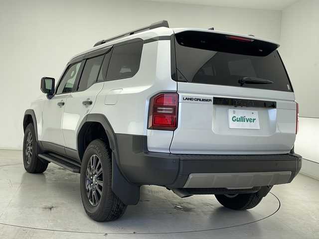 トヨタ ランドクルーザー ２５０ VX 千葉県 2024(令6)年 0.5万km プラチナホワイトパールマイカ 衝突被害軽減システム/レーンキープアシスト/ブラインドスポットモニター/レーダークルーズコントロール/コーナーセンサー（前後）/サンルーフ/純正メモリナビ/　（Bluetooth/USB/フルセグTV）/Miracast/HDMI/ワイヤレス充電/車外カメラ/　（バック/全方位）/純正ETC2.0/デジタルインナーミラー/パワーシート（D席）/エアシート（D/N席）/シートヒーター（D/N席）/純正フロアマット/MTモード付AT/オートハイビーム/LEDヘッドライト/純正18インチアルミホイール