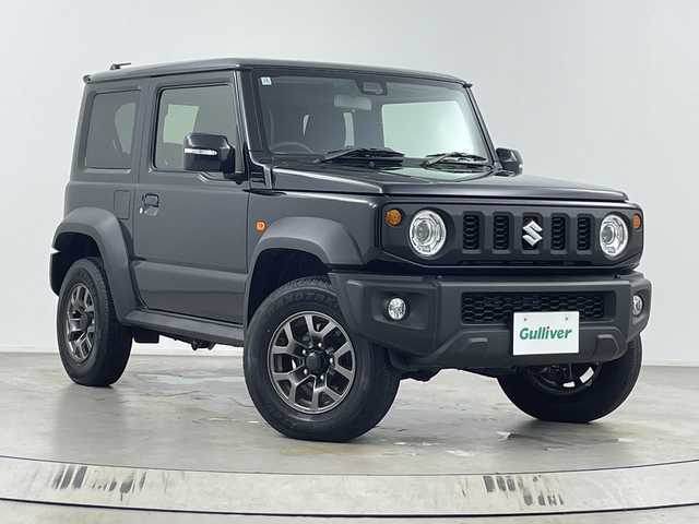 スズキ ジムニー シエラ JC 埼玉県 2024(令6)年 0.3万km ブルーイッシュブラックパール3 クルーズコントロール/車線逸脱警報/衝突軽減ブレーキ/クリアランスソナー/アイドリングストップ/ダウンヒルアシストコントロール/運転席・助手席シートヒーター/プッシュスタート/ステアリングリモコン/LEDヘッドライト/フロントフォグランプ/ウィンカーミラー/純正15インチアルミホイール