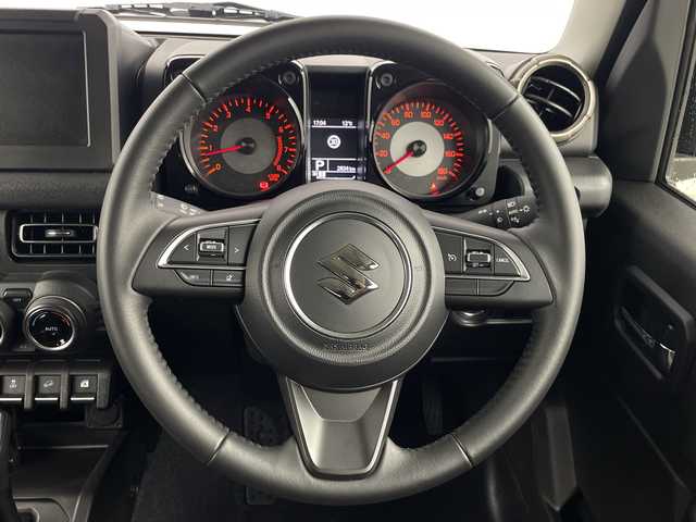 スズキ ジムニー シエラ JC 埼玉県 2024(令6)年 0.3万km ブルーイッシュブラックパール3 クルーズコントロール/車線逸脱警報/衝突軽減ブレーキ/クリアランスソナー/アイドリングストップ/ダウンヒルアシストコントロール/運転席・助手席シートヒーター/プッシュスタート/ステアリングリモコン/LEDヘッドライト/フロントフォグランプ/ウィンカーミラー/純正15インチアルミホイール