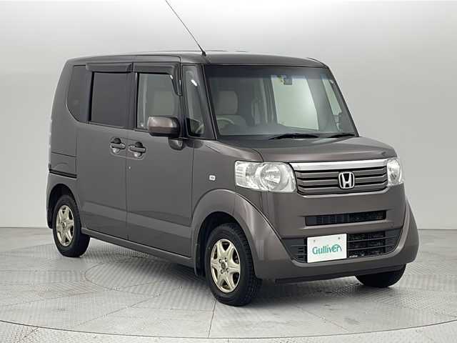 ホンダ Ｎ ＢＯＸ G Lパッケージ 新潟県 2012(平24)年 12万km プレミアムブロンズパール 4WD/社外SDナビ/(AM/FM/CD/DVD/SD/フルセグ/Bluetooth)/前後ドライブレコーダー/両側パワースライドドア/夏タイヤ積込/(145/80/R13/3mm)/横滑り防止装置/純正フロアマット/ドアバイザー/ヘッドライトレベライザー/スマートキー/ETC