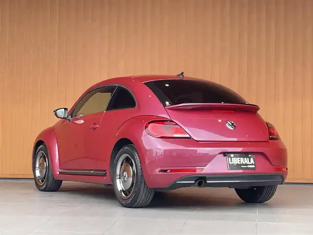 フォルクスワーゲン ザ・ビートル ハッシュタグピンクビートル 愛知県 2016(平28)年 4.9万km ピンク スマートエントリー /プッシュスタート /純正ナビ /バックカメラ/フルセグTV /Bluetooth /リアスポイラー /HIDヘッドライト　/ＭＴモード付ＡＴ　/クルーズコントロール　/ＥＴＣ/ドラレコ/スマートキー