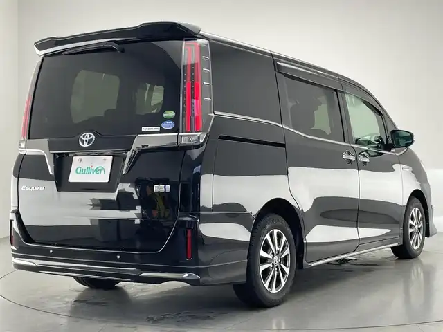 トヨタ エスクァイア ハイブリッド Gi プレミアムパッケージ ブラックテーラード 愛知県 2020(令2)年 7.6万km ブラック 純正１０型ナビ　純正１２．１型後席モニター　純正エアロ　ナビ連動前後ドラレコ　ハーフレザー　シートヒーター　ＡＣ１００Ｖ電源　バックカメラ　セーフティセンス　衝突軽減　ＬＥＤオートライト　コーナーセンサー　禁煙車