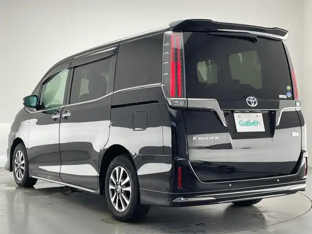 トヨタ エスクァイア ハイブリッド Gi プレミアムパッケージ ブラックテーラード 愛知県 2020(令2)年 7.6万km ブラック 純正１０型ナビ　純正１２．１型後席モニター　純正エアロ　ナビ連動前後ドラレコ　ハーフレザー　シートヒーター　ＡＣ１００Ｖ電源　バックカメラ　セーフティセンス　衝突軽減　ＬＥＤオートライト　コーナーセンサー　禁煙車