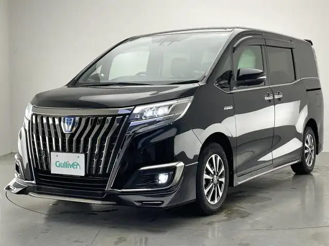 トヨタ エスクァイア ハイブリッド Gi プレミアムパッケージ ブラックテーラード 愛知県 2020(令2)年 7.6万km ブラック 純正１０型ナビ　純正１２．１型後席モニター　純正エアロ　ナビ連動前後ドラレコ　ハーフレザー　シートヒーター　ＡＣ１００Ｖ電源　バックカメラ　セーフティセンス　衝突軽減　ＬＥＤオートライト　コーナーセンサー　禁煙車