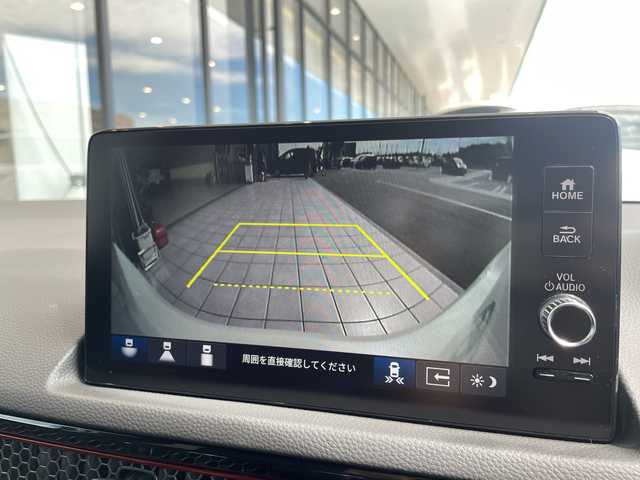 ホンダ シビック RS 愛知県 2025(令7)年 0.6万km プラチナホワイトパール 6速マニュアル車/純正SDナビ/フルセグテレビ/バックカメラ/ハーフレザーシート/前席シートヒーター/衝突軽減ブレーキ/レーダークルーズコントロール/DRIVE MODE/ビルトインETC2.0/置くだけ充電/ドライブレコーダー/LEDヘッドライト/無限フロアマット/前席パワーシート/BSM/純正アルミホイール/社外レーダー/プッシュスタート/ワンオーナー/スマートキー