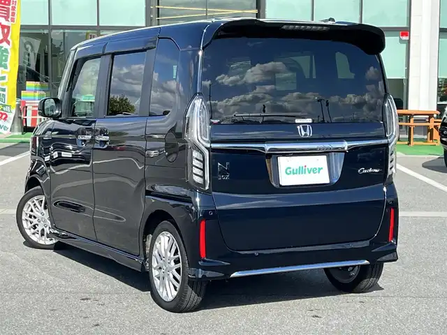 ホンダ Ｎ ＢＯＸ カスタム L ターボ 奈良県 2021(令3)年 1.8万km ミッドナイトブルービームM 純正8インチナビ(VXU-217NBi)/（フルセグ/BT/CD/DVD)/レーダークルーズコントロール/バックカメラ/パドルシフト/後方コーナーセンサー/衝突軽減システム/レーンキープアシスト/両側パワースライドドア/ハーフレザーシート/前席シートヒーター/後席サンシェード/前後ドライブレコーダー/ETC/LEDヘッドライト/純正15インチAW/保証書/取り扱い説明書