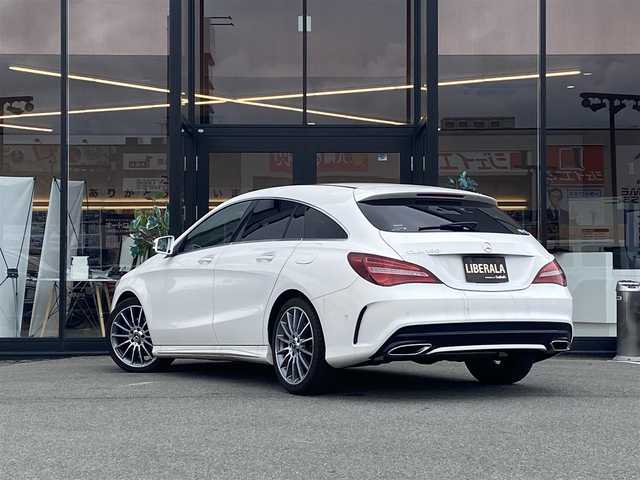 メルセデス・ベンツ ＣＬＡ１８０ Sブレイク AMG スタイル 福岡県 2018(平30)年 2.1万km ポーラホワイト ・サンルーフ/・クルーズコントロール/・純正ＨＤＤナビ／ＵＳＢ／Ｂｌｕｅｔｏｏｔｈ／ｉＰｏｄ／ＣＤ/・バックカメラ/・ハーフレザーシート／シートヒーター/・フルセグ/・ＥＴＣ/・純正１８ＡＷ/・パーキングアシスト/・アイドリングストップ/・パワーシート/・レーンキープアシスト/・オートライト/・LEDライト/・パドルシフト/・保証書/・取扱説明書