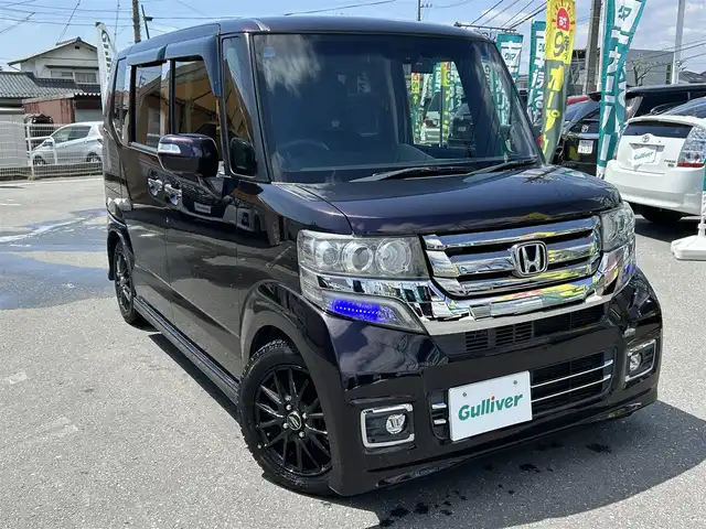 ホンダ Ｎ ＢＯＸ カスタム G ターボ Lパッケージ 長野県 2015(平27)年 5.9万km マジソンブルーパール 社外ナビ（FM/AM、CD、DVD、BT）/フルセグテレビ/バックカメラ/クルーズコントロール追従無/アイドリングストップ/ETC/前方ドライブレコーダー/前席シートヒーター/衝突軽減システム/純正フロアマット/ダブルサイドエアバック/カーテンエアバック/キセノンヘッドライト/オートライト/ABS/スペアキー（１本）/社外１４AW/プッシュスタート/保証書、取扱説明書