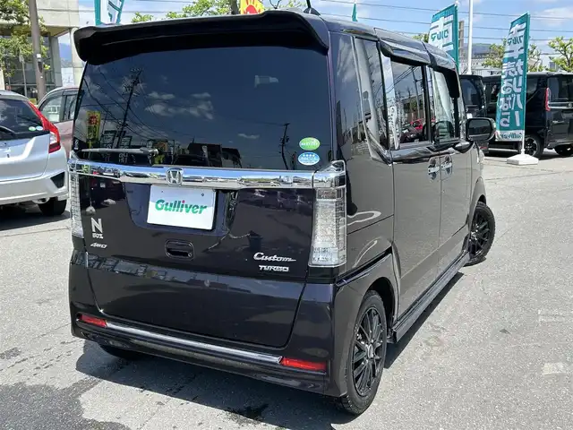 ホンダ Ｎ ＢＯＸ カスタム G ターボ Lパッケージ 長野県 2015(平27)年 5.9万km マジソンブルーパール 社外ナビ（FM/AM、CD、DVD、BT）/フルセグテレビ/バックカメラ/クルーズコントロール追従無/アイドリングストップ/ETC/前方ドライブレコーダー/前席シートヒーター/衝突軽減システム/純正フロアマット/ダブルサイドエアバック/カーテンエアバック/キセノンヘッドライト/オートライト/ABS/スペアキー（１本）/社外１４AW/プッシュスタート/保証書、取扱説明書