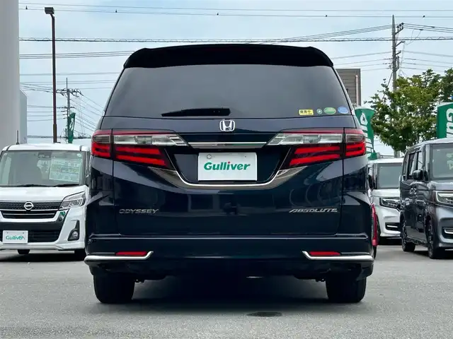ホンダ オデッセイ アブソルート ホンダセンシング 静岡県 2017(平29)年 6.9万km 黒 エンジンスタートボタン/パワーステアリング/パワーウィンドウ/パドルシフト/アイドリングストップ/スマートキー/Wオートエアコン/クルーズコントロール追従走行/Bluetooth/CD/CDチェンジャー/USB入力端子/ETC2.0/バックカメラ/TV/メモリナビ/3列シート/オットマン/純正前方ドラレコ/ウォークスルー/純正フロアマット/D席パワーシート/布シート/両側パワースライドドア/純正サイドエアロパーツ/純正アルミホイール/ABS/横滑り防止装置/レーンキープアシスト/オートライト/W＋サイドエアバッグ/衝突軽減システム/カーテンエアバック