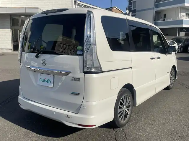日産 セレナ HWS S HV Vセレ +Sefty 静岡県 2015(平27)年 8.7万km ブリリアントホワイトパール エマージェンシーブレーキ/アラウンドビューモニター/横滑り防止機能/車線逸脱警報/クルーズコントロール/フリップダウンモニター/純正SDナビ/・フルセグ/Bluetooth/SD/CD/DVD/両側パワースライドドア/LEDヘッドライト/フォグライト/スマートキーｘ２/プッシュスタート/2列目サンシェード/2列目パーソナルテーブル/純正16インチAW/ETC/ドアバイザー/純正フロアマット/新車時保証書/取扱説明書