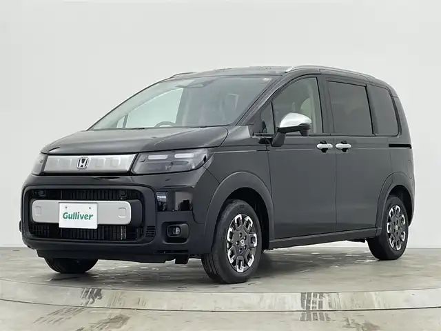 ホンダ フリード ハイブリット e:HEV クロスター 宮城県 2025(令7)年 0.1千km クリスタルブラックパール e:HEV クロスター　4WD　2LE80Z　6人　9インチナビ　LXM-242ZFNI(207680円)/登録済未使用車/純正９型ナビ/バックモニター/両側オートスライドドア/アダプティブクルーズコントロール/衝突軽減ブレーキ/レーンキープアシスト/オートハイビーム/シートヒーター/ハーフレザーシート/LEDヘッドライト/ルーフレール/フロントウィンドウ熱線