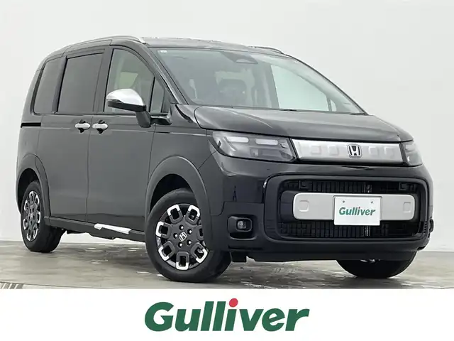 ホンダ フリード ハイブリット e:HEV クロスター 宮城県 2025(令7)年 0.1千km クリスタルブラックパール e:HEV クロスター　4WD　2LE80Z　6人　9インチナビ　LXM-242ZFNI(207680円)/登録済未使用車/純正９型ナビ/バックモニター/両側オートスライドドア/アダプティブクルーズコントロール/衝突軽減ブレーキ/レーンキープアシスト/オートハイビーム/シートヒーター/ハーフレザーシート/LEDヘッドライト/ルーフレール/フロントウィンドウ熱線