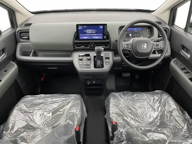 ホンダ フリード ハイブリット e:HEV クロスター 宮城県 2025(令7)年 0.1千km クリスタルブラックパール e:HEV クロスター　4WD　2LE80Z　6人　9インチナビ　LXM-242ZFNI(207680円)/登録済未使用車/純正９型ナビ/バックモニター/両側オートスライドドア/アダプティブクルーズコントロール/衝突軽減ブレーキ/レーンキープアシスト/オートハイビーム/シートヒーター/ハーフレザーシート/LEDヘッドライト/ルーフレール/フロントウィンドウ熱線