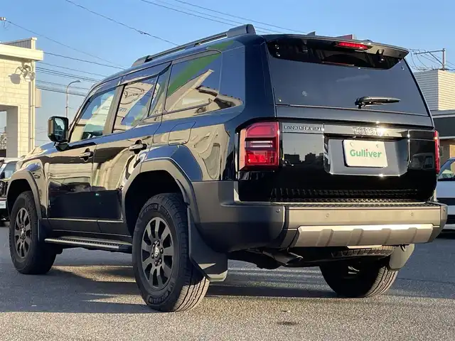 トヨタ ランドクルーザー ２５０ VX ファーストエディション 広島県 2024(令6)年 0.5万km ブラック 丸目ヘッドライト/アドバンストドライブ/ワンオーナー/サンルーフ/純正ナビ（フルセグTV/HDMI/Bluetooth）/JBLプレミアムサウンド/全方位モニター/ETC2.0/デジタルインナーミラー/ルーフレール/置くだけ充電/ブラウンレザーシート/・シートヒーター/・エアシート/・パワーシート/衝突被害軽減ブレーキ/車線逸脱警報/オートマチックハイビーム/ブラインドスポットモニター/レーダークルーズコントロール/コーナーセンサー/ステアリングヒーター/パワーバックドア/スペアキー