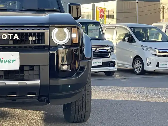 トヨタ ランドクルーザー ２５０ VX ファーストエディション 広島県 2024(令6)年 0.5万km ブラック 丸目ヘッドライト/アドバンストドライブ/ワンオーナー/サンルーフ/純正ナビ（フルセグTV/HDMI/Bluetooth）/JBLプレミアムサウンド/全方位モニター/ETC2.0/デジタルインナーミラー/ルーフレール/置くだけ充電/ブラウンレザーシート/・シートヒーター/・エアシート/・パワーシート/衝突被害軽減ブレーキ/車線逸脱警報/オートマチックハイビーム/ブラインドスポットモニター/レーダークルーズコントロール/コーナーセンサー/ステアリングヒーター/パワーバックドア/スペアキー