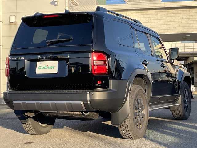 トヨタ ランドクルーザー ２５０ VX ファーストエディション 広島県 2024(令6)年 0.5万km ブラック 丸目ヘッドライト/アドバンストドライブ/ワンオーナー/サンルーフ/純正ナビ（フルセグTV/HDMI/Bluetooth）/JBLプレミアムサウンド/全方位モニター/ETC2.0/デジタルインナーミラー/ルーフレール/置くだけ充電/ブラウンレザーシート/・シートヒーター/・エアシート/・パワーシート/衝突被害軽減ブレーキ/車線逸脱警報/オートマチックハイビーム/ブラインドスポットモニター/レーダークルーズコントロール/コーナーセンサー/ステアリングヒーター/パワーバックドア/スペアキー