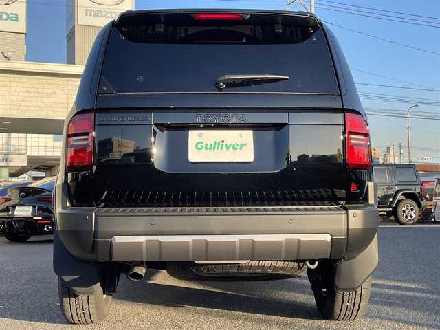トヨタ ランドクルーザー ２５０ VX ファーストエディション 広島県 2024(令6)年 0.5万km ブラック 丸目ヘッドライト/アドバンストドライブ/ワンオーナー/サンルーフ/純正ナビ（フルセグTV/HDMI/Bluetooth）/JBLプレミアムサウンド/全方位モニター/ETC2.0/デジタルインナーミラー/ルーフレール/置くだけ充電/ブラウンレザーシート/・シートヒーター/・エアシート/・パワーシート/衝突被害軽減ブレーキ/車線逸脱警報/オートマチックハイビーム/ブラインドスポットモニター/レーダークルーズコントロール/コーナーセンサー/ステアリングヒーター/パワーバックドア/スペアキー