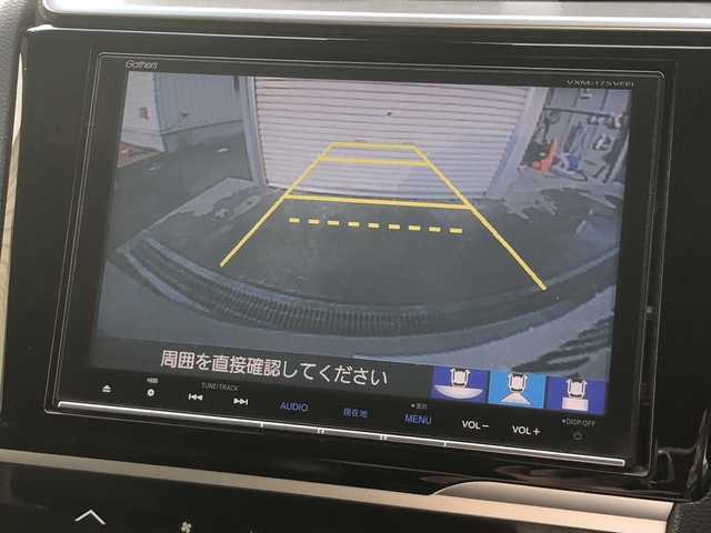 ホンダ フィット ハイブリット Lパッケージ 愛媛県 2016(平28)年 7.2万km ティンテッドシルバーM １オーナー　/ギャザーズナビ(VXM-175VFi)/・CD/DVD/フルセグTV/MSV/Bluetooth /バックカメラ /前方ドライブレコーダー /ハーフレザーシート /クルーズコントロール/LEDオートライト /社外レーダー/プッシュスタート/・スペアキー/取扱説明書/保証書