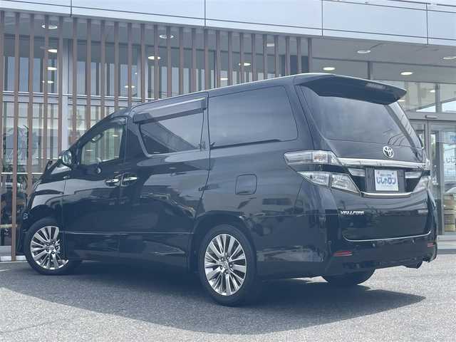 トヨタ ヴェルファイア 2．4Z ゴールデンアイズⅡ 山口県 2014(平26)年 13.3万km ブラック (株)IDOMが運営する【じしゃロン宇部店】の自社ローン専用車両になります。こちらは現金またはオートローンご利用時の価格です。自社ローンご希望の方は別途その旨お申付け下さい/純正SDナビ（NSZT-W62G）/・フルセグ/CD/DVD/BT/バックカメラ/純正フリップダウンモニター/両側パワースライドドア/HIDオートライト/2列目オットマンシート/ウッドコンビステアリング/ステアリングスイッチ/クルーズコントロール/前後クリアランスソナー/パワーバックドア/ビルトインETC/スマートキー×2/プッシュスタート
