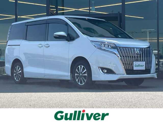 トヨタ エスクァイア ハイブリッド Gi 東京都 2020(令2)年 6万km ホワイトパールクリスタルシャイン 純正9インチメモリナビゲーション/【フルセグ/Bluetooth/DVD/MSV】/１２．１インチフリップダウンモニター/バックカメラ/純正15inアルミホイール/冬タイヤ×ホイール積込/クルーズコントロール/ビルトインETC/LEDヘッドライト（AUTO機能付き）/シートヒーター/横滑り防止機能/衝突軽減システム/車線逸脱防止システム/プッシュスタート/コーナーセンサー/純正フロアマット/新車保証書/取扱説明書/スペアキー×１