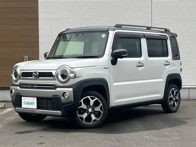 マツダ フレア クロスオーバー ハイブリッドXT スペシャル 秋田県 2021(令3)年 5.4万km パールⅡ ワンオーナー/ターボ/４WD/衝突軽減システム/LEDヘッドライト/純正メモリナビ（DVD/CD/BT/AM/FM/USB）/フルセグ（走行中視聴不可能）/３６０°ビューモニター/マツダ純正１５インチアルミ（夏タイヤ装着）/スマートキー/アイドリングストップ/プッシュスタート/クルーズコントロール追従走行有/オートマチックハイビーム/コーナーセンサー/レーンキープアシスト/ダウンヒルアシストコントロール/ステアリングスイッチ/パドルシフト/前席シートヒーター/ルーフレール/ビルトインETC/純正ドアバイザー/オートライト/オートエアコン/パワーステアリング/パワーウィンドウ/横滑り防止/盗難防止装置/寒冷地仕様/電動格納ウィンカーミラー/保証書/取扱説明書/記録簿/スペアキー×１