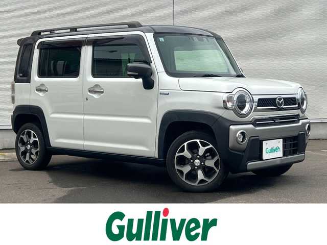 マツダ フレア クロスオーバー ハイブリッドXT スペシャル 秋田県 2021(令3)年 5.4万km パールⅡ ワンオーナー/ターボ/４WD/衝突軽減システム/LEDヘッドライト/純正メモリナビ（DVD/CD/BT/AM/FM/USB）/フルセグ（走行中視聴不可能）/３６０°ビューモニター/マツダ純正１５インチアルミ（夏タイヤ装着）/スマートキー/アイドリングストップ/プッシュスタート/クルーズコントロール追従走行有/オートマチックハイビーム/コーナーセンサー/レーンキープアシスト/ダウンヒルアシストコントロール/ステアリングスイッチ/パドルシフト/前席シートヒーター/ルーフレール/ビルトインETC/純正ドアバイザー/オートライト/オートエアコン/パワーステアリング/パワーウィンドウ/横滑り防止/盗難防止装置/寒冷地仕様/電動格納ウィンカーミラー/保証書/取扱説明書/記録簿/スペアキー×１