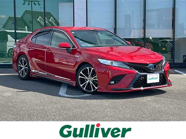 トヨタ カムリ WSレザーパッケージ 岐阜県 2019(令1)年 5.9万km エモーショナルレッドⅡ 登録時走行距離：58295km/純正ナビ/バックカメラ/フルセグテレビ・Bluetooth/TRDエアロ/TRDマフラー/スポーツサスペンション/ガーニッシュ/JBLサウンド/本革シート/シートヒーター/トヨタセーフティーセンス/ブラインドスポットモニター/レーダークルーズコントロール/ETC/LEDヘッドライト/オートライト/オートハイビーム/パワーシート/プッシュスタート/スマートキー