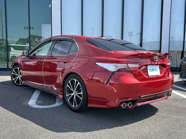 トヨタ カムリ WSレザーパッケージ 岐阜県 2019(令1)年 5.9万km エモーショナルレッドⅡ 登録時走行距離：58295km/純正ナビ/バックカメラ/フルセグテレビ・Bluetooth/TRDエアロ/TRDマフラー/スポーツサスペンション/ガーニッシュ/JBLサウンド/本革シート/シートヒーター/トヨタセーフティーセンス/ブラインドスポットモニター/レーダークルーズコントロール/ETC/LEDヘッドライト/オートライト/オートハイビーム/パワーシート/プッシュスタート/スマートキー