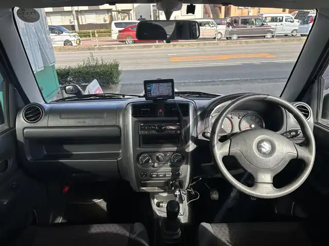 スズキ ジムニー XC 愛知県 2010(平22)年 9.3万km ノクターンブルーパール 4WD/5速MT/ETC/ポータブルナビ/カーオーディオFM/AM/純正アルミホイール/純正フロアマット/背面タイヤ/ルーフレール/パワーウインドウ/パワーステアリング/スペアキー/ABS