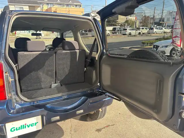 スズキ ジムニー XC 愛知県 2010(平22)年 9.3万km ノクターンブルーパール 4WD/5速MT/ETC/ポータブルナビ/カーオーディオFM/AM/純正アルミホイール/純正フロアマット/背面タイヤ/ルーフレール/パワーウインドウ/パワーステアリング/スペアキー/ABS