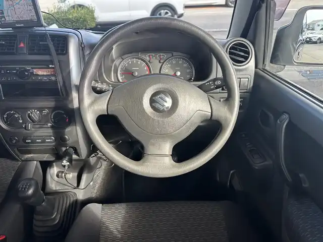 スズキ ジムニー XC 愛知県 2010(平22)年 9.3万km ノクターンブルーパール 4WD/5速MT/ETC/ポータブルナビ/カーオーディオFM/AM/純正アルミホイール/純正フロアマット/背面タイヤ/ルーフレール/パワーウインドウ/パワーステアリング/スペアキー/ABS