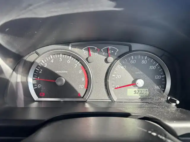 スズキ ジムニー XC 愛知県 2010(平22)年 9.3万km ノクターンブルーパール 4WD/5速MT/ETC/ポータブルナビ/カーオーディオFM/AM/純正アルミホイール/純正フロアマット/背面タイヤ/ルーフレール/パワーウインドウ/パワーステアリング/スペアキー/ABS