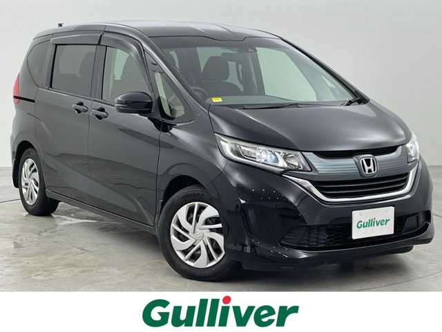 ホンダ フリード G ホンダセンシング 福岡県 2017(平29)年 6.4万km クリスタルブラックパール フリップダウンモニター　/純正ナビ（フルセグＴＶ）　/バックカメラ　/ＥＴＣ　/ホンダセンシング　/アダプティブクルコン　/コーナーセンサー　/衝突被害軽減　/レーンキープ　/両側電動スライドドア　/ＬＥＤヘッドライト
