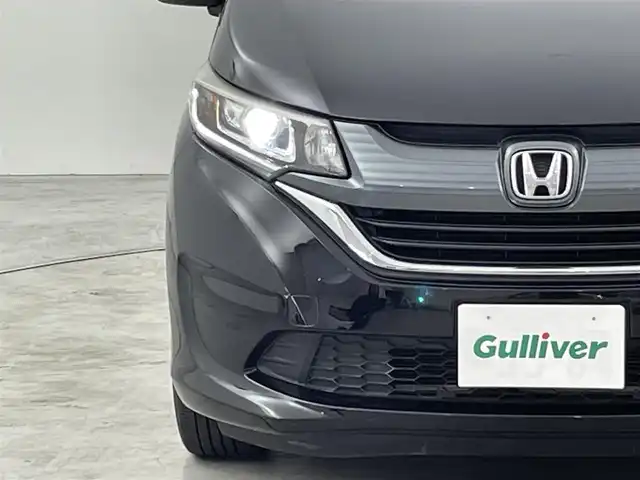 ホンダ フリード G ホンダセンシング 福岡県 2017(平29)年 6.4万km クリスタルブラックパール フリップダウンモニター　/純正ナビ（フルセグＴＶ）　/バックカメラ　/ＥＴＣ　/ホンダセンシング　/アダプティブクルコン　/コーナーセンサー　/衝突被害軽減　/レーンキープ　/両側電動スライドドア　/ＬＥＤヘッドライト